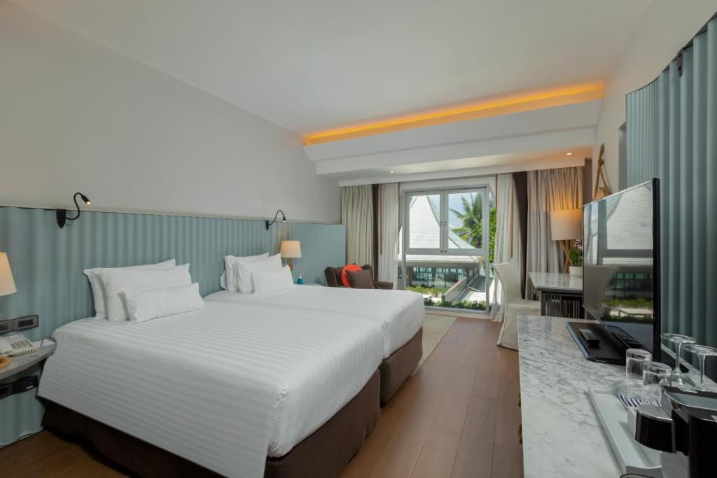 The Boathouse Phuket-Sha Plus Praia de Kata Exterior foto